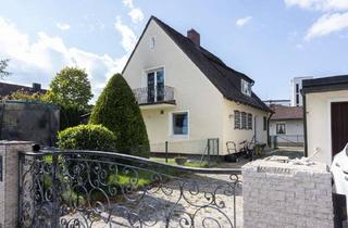 Einfamilienhaus kaufen in 82152 Planegg, FREISTEHENDES EINFAMILIENHAUS mit DOPPELGARAGE in ZENTRALER LAGE von PLANEGG