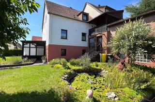 Doppelhaushälfte kaufen in 66482 Niederauerbach, Charmante Doppelhaushälfte in ruhiger Wohnlage mit Garten