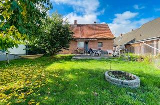 Einfamilienhaus kaufen in 38268 Lengede, 4-Zimmer-Einfamilienhaus mit Einfahrt, Einbauküche, Kamin, Terrasse und großem Garten