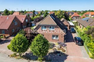 Einfamilienhaus kaufen in 26556 Westerholt, Attraktives Einfamilienhaus mit Garage im Westerholter Ortskern!