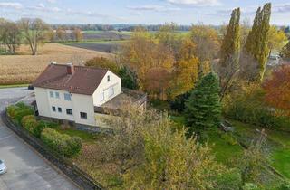 Haus kaufen in 88471 Laupheim, Wohnglück! Großes Zweifamilienhaus mit traumhaftem Gartenparadies inklusive Baugrundstück