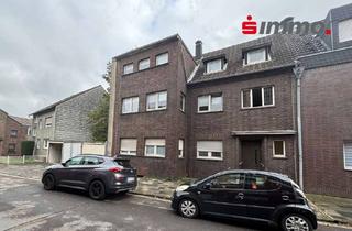 Anlageobjekt in 52477 Alsdorf, Dreifamilienhaus mit 3 Garagen auf großem Grundstück mit weiterem Baupotential in ruhiger Wohnlage