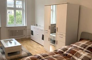 Wohnung kaufen in Karl-Marx-Allee 125, 10243 Friedrichshain, Leben in historischem Gebäude: Helle 1-Zimmer-Wohnung, sehr gut vermietet!
