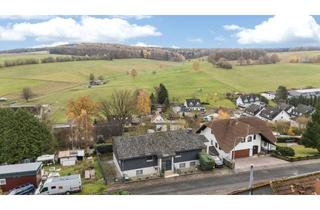 Haus kaufen in 63637 Jossgrund, Zwei- bis Dreifamilienhaus auf großem Grundstück – modernisiert & vielseitig nutzbar