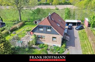 Einfamilienhaus kaufen in 24649 Wiemersdorf, Großzügiges Einfamilienhaus mit Einliegerwohnung auf herrlichem Grundstück von Wiemersdorf