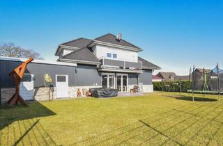 Haus kaufen in 26219 Bösel, Provisionsfrei - Vermietetes Zweifamilienhaus in Bösel zu verkaufen