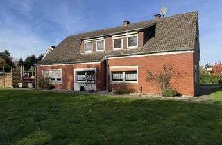 Haus kaufen in 49685 Emstek, Emstek - Teilmodernisiertes Zweifamilienhaus mit Werkstatt und Doppelgarage