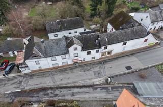 Haus kaufen in Wisperstrasse, 56357 Strüth, Attraktives Anwesen für Investoren & Selbstnutzer – 4 Häuser mit Wohn- & Gewerbefläche auf 1.666 m²