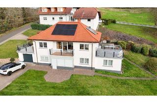 Haus kaufen in 66871 Thallichtenberg, Ein-/Zweifamilienhaus mit Garage und Carport in Thallichtenberg