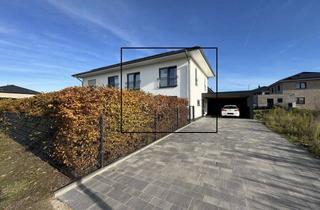Doppelhaushälfte kaufen in 49577 Ankum, Freistehend - Neuwertige Doppelhaushälfte mit PV Anlage, modernster Küche und Carport in toller Lage