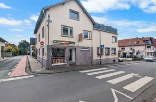 Anlageobjekt in 61273 Wehrheim, Mehrfamilienhaus mit Gewerbeeinheit in zentraler Lage von Wehrheim-Stadt