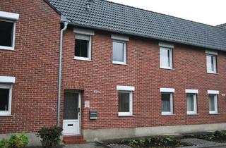 Wohnung kaufen in 41812 Erkelenz, Erkelenz - Modernisierte Maisonette-Wohnung mit Garage und eigenem Garten