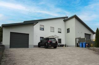 Anlageobjekt in 66882 Hütschenhausen, Modernes Wohnen trifft Arbeiten unter einem Dach – Exklusives Einfamilienhaus mit Gewerbeeinheit