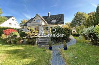 Haus kaufen in 24248 Mönkeberg, Zweifamilienhaus mit Gartenidylle in Spielstraßenlage