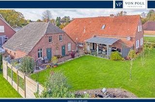 Haus kaufen in 26629 Großefehn, Teilsanierter Resthof mit Nebengebäude in Kanallage von Großefehn