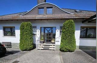 Haus kaufen in 35457 Lollar, Wohnen mit Weitblick: Vier-Familienhaus mit Terrasse, Gartenoase & flexiblen Nutzungsmöglichkeiten