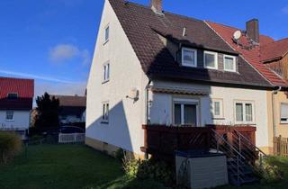 Doppelhaushälfte kaufen in 34266 Niestetal, Niestetal - Charmante Doppelhaushälfte mit großem Potenzial und idyllischem Grundstück in Niestetal-Sandershausen