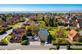 Wohnung kaufen in 26969 Butjadingen, Exklusives Nordsee-Ferienhaus mit drei Einheiten und Wellnessbereich