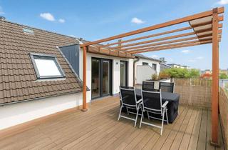 Wohnung kaufen in 60388 Bergen-Enkheim, Lichtdurchflutete Dachgeschosswohnung mit großzügiger Terrasse