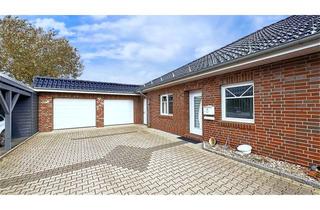 Doppelhaushälfte kaufen in 26639 Wiesmoor, Ebenerdige Bungalowhälfte mit großer Doppelgarage und integrierter Werkstatt