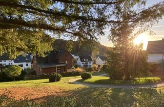Einfamilienhaus kaufen in 35688 Dillenburg, Charmantes Einfamilienhaus mit Garage und großzügigem Grundstück