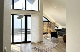 Wohnung kaufen in 65207 Breckenheim, Individuelle Dachgeschosswohnung in Feldrandlage - ideal für Paare oder Singles