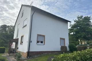 Einfamilienhaus kaufen in Am Forsthaus, 65510 Hünstetten, Familienidylle im Grünen: Einfamilienhaus mit Anbau, Garage und Garten