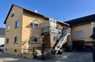 Mehrfamilienhaus kaufen in 76547 Sinzheim, Teilvermietetes Mehrfamilienhaus mit 4 Wohnungen und 4 Garagen in Sinzheim-Kartung!
