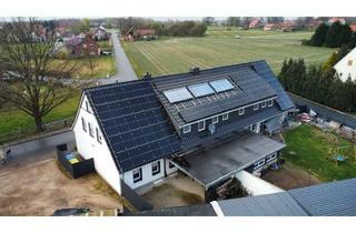 Mehrfamilienhaus kaufen in 32339 Espelkamp, Mehrfamilienhaus mit Rendite, Geschichte und moderner Technik – saniertes ehemaliges Schulgebäude