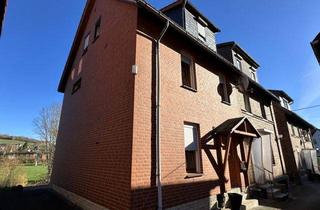 Doppelhaushälfte kaufen in 31084 Freden, Charmante Doppelhaushälfte mit Garage, Nebengebäude und Garten