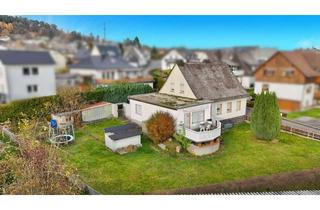 Wohnung kaufen in 35764 Sinn, Einfamilienhaus mit Garten und Garage in Sinn OT