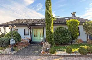 Haus kaufen in 55234 Biebelnheim, Stilvoller Bungalow mit vielseitig nutzbaren Untergeschoss