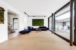 Haus kaufen in 82178 Puchheim, AIGNER - Wunderschönes Architektenhaus mit hochwertiger Ausstattung und Gartendomizil