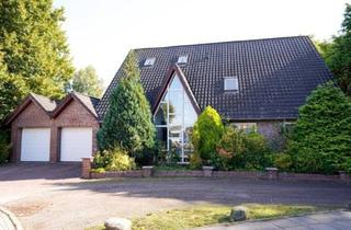 Einfamilienhaus kaufen in 26427 Esens, Esens - Exklusives Wohnen mit parkähnlichem Grundstück!