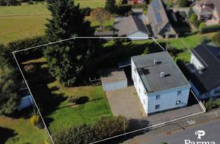 Einfamilienhaus kaufen in 52393 Hürtgenwald, Sanierungsbedürftiges Einfamilienhaus mit Baugrundstück und Doppelgarage in Hürtgenwald-Bergstein