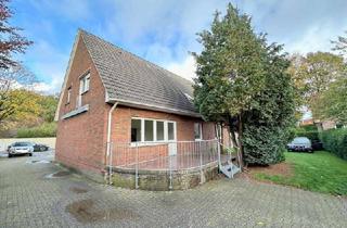 Haus kaufen in 49757 Werlte, Zweifamilienhaus mit Doppelgarage in zentraler Lage von Werlte zu verkaufen