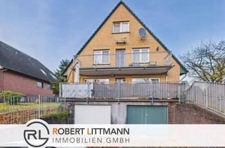 Mehrfamilienhaus kaufen in 27711 Osterholz-Scharmbeck, Attraktives Mehrfamilienhaus mit drei Wohneinheiten und umfangreicher Modernisierung