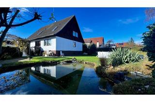 Haus kaufen in 77977 Rust, Gepflegtes Zweifamilienhaus mit Pool, Carport & großem Garten in 77977 Rust