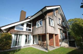 Villa kaufen in 49186 Bad Iburg, Luxuriöses Architektenhaus mit ELW und Pool in ruhiger Villenlage