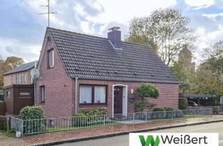 Einfamilienhaus kaufen in 25361 Krempe, Familienfreundliches Einfamilienhaus mit großem Wintergarten und praktischer Garage in Krempe