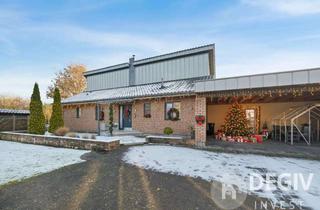 Einfamilienhaus kaufen in 24819 Todenbüttel, Gehobenes Wohnen: Einfamilienhaus mit 6 Stellplätzen und Photovoltaik