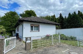 Einfamilienhaus kaufen in 61476 Kronberg, Ebenerdiges Einfamilienhaus mit Vollkeller u. Doppelgarage in der Stadt Kronberg im Taunus/ Metropolstadt Frankfurt