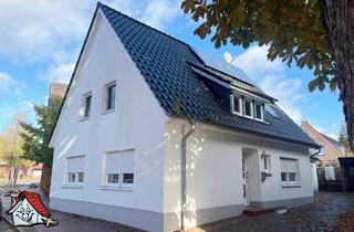 Einfamilienhaus kaufen in 26169 Friesoythe, Attraktive Kapitalanlage in Friesoythe – saniertes Zweifamilienhaus mit zwei vermieteten Wohnungen!