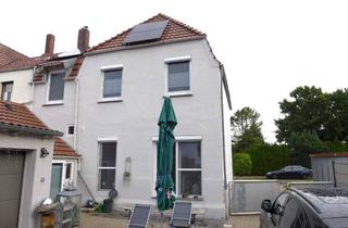 Doppelhaushälfte kaufen in 26954 Nordenham, Modernisierte Doppelhaushälfte mit Garage, Innenhof und Garten