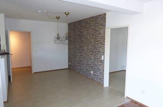 Wohnung kaufen in 61203 Reichelsheim, Renovierte 2,5-Zimmer-Wohnung mit Balkon und Tiefgaragenstellplatz – Ihr Wohlfühlzuhause!