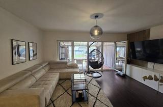 Wohnung kaufen in 65428 Rüsselsheim, Hochwertige Terrassenwohnung mit Garten und Sondernutzungsrecht in Rüsselsheim am Main