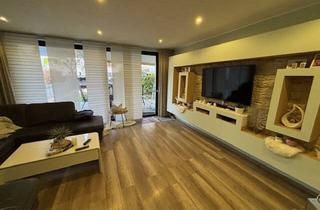 Reihenhaus kaufen in 33378 Rheda-Wiedenbrück, Modernisiertes Reihenhaus mit Garten, Sauna und Garage in ruhiger Lage von Rheda