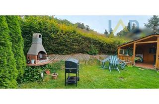 Immobilie kaufen in 34298 Helsa, Attraktives Baugrundstück (ca. 310 m²) in Helsa mit Genehmigung für Mehrfamilienhaus.