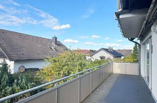 Wohnung kaufen in 64569 Nauheim, Großzügige 2,5 Zimmer Wohnung mit Balkon und zwei Stellplätzen