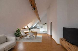 Wohnung kaufen in 71134 Aidlingen, Stilvolle 2-Zimmer-Dachgeschosswohnung mit offener Wohnküche, Luftraum & Balkonaussicht